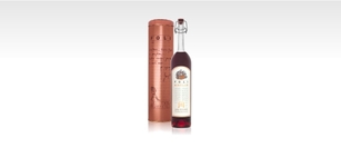 Poli Mirtillo with metal tube, liqueur with Grappa and blueberry infusion Poli Mirtillo with metal tube, liqueur with Grappa and blueberry infusion