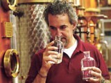 Jacopo Poli checks the distillate