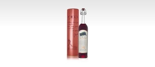 Poli Mirtillo with metal tube, liqueur with Grappa and blueberry infusion Poli Mirtillo with metal tube, liqueur with Grappa and blueberry infusion